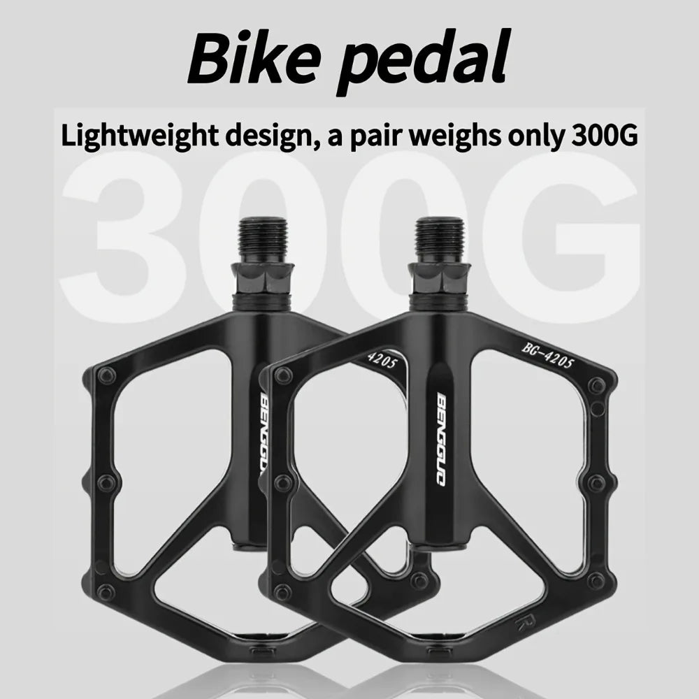 A pair of lightweight aluminum alloy bicycle pedals - sealed bearings, wide platform, flat design, easy to ride