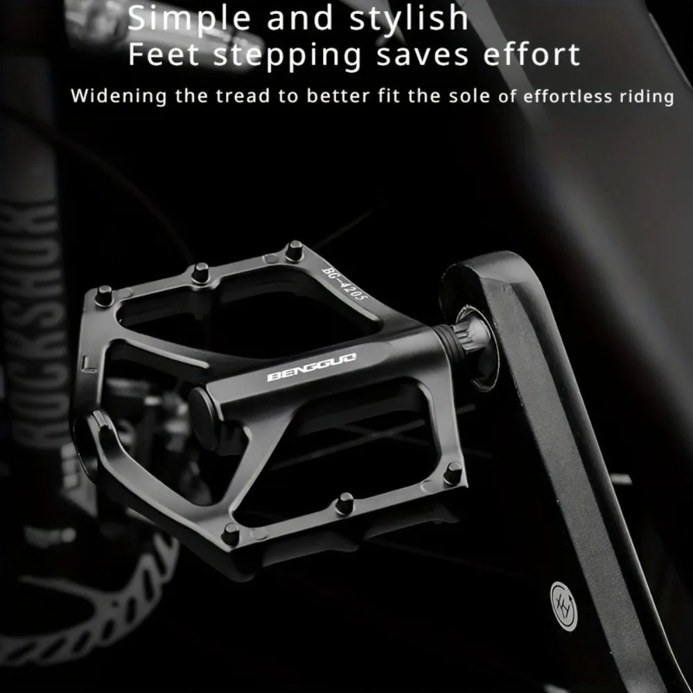 A pair of lightweight aluminum alloy bicycle pedals - sealed bearings, wide platform, flat design, easy to ride
