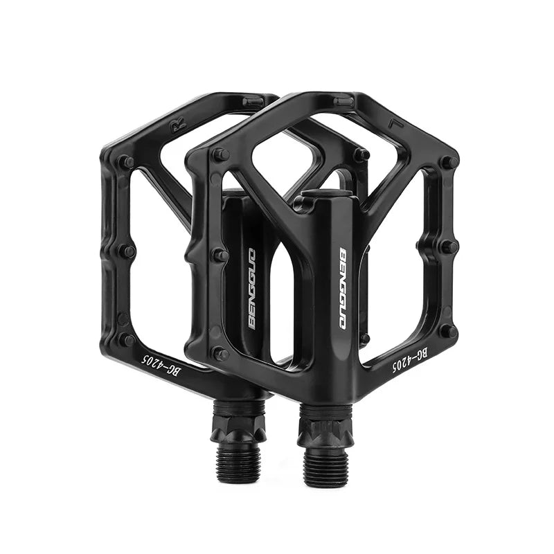 A pair of lightweight aluminum alloy bicycle pedals - sealed bearings, wide platform, flat design, easy to ride