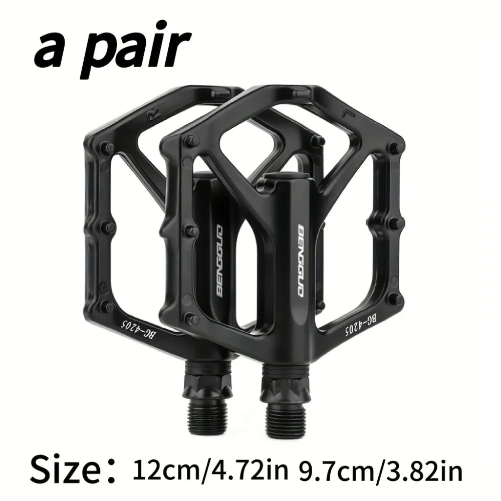 A pair of lightweight aluminum alloy bicycle pedals - sealed bearings, wide platform, flat design, easy to ride