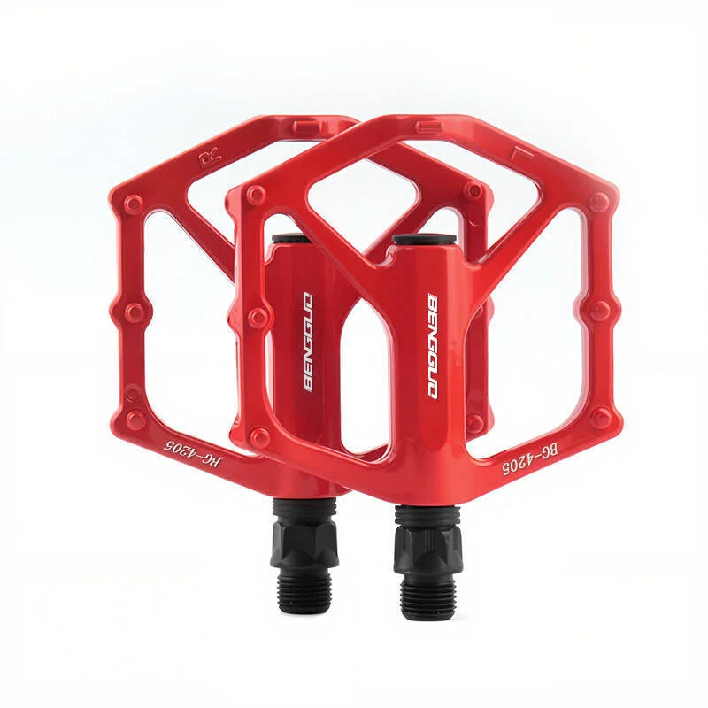 A pair of lightweight aluminum alloy bicycle pedals - sealed bearings, wide platform, flat design, easy to ride